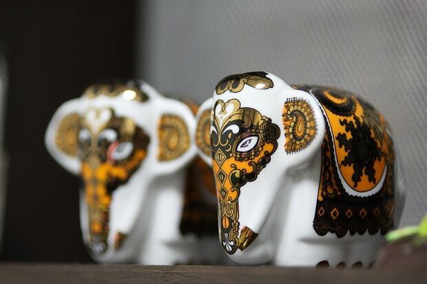 The elephant figurine brings good luck in a career